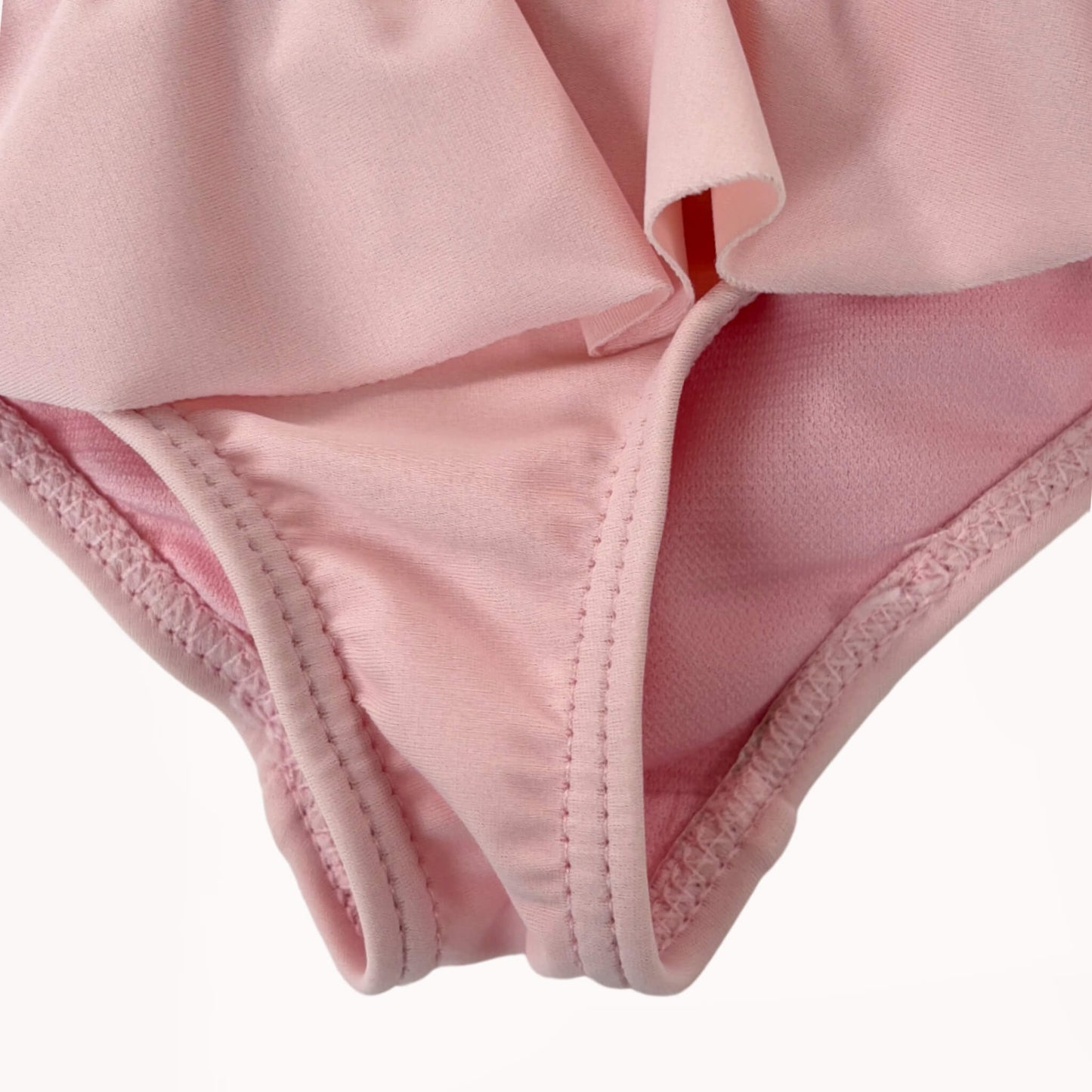 Roze badpakje met bloementjes⎪74/80