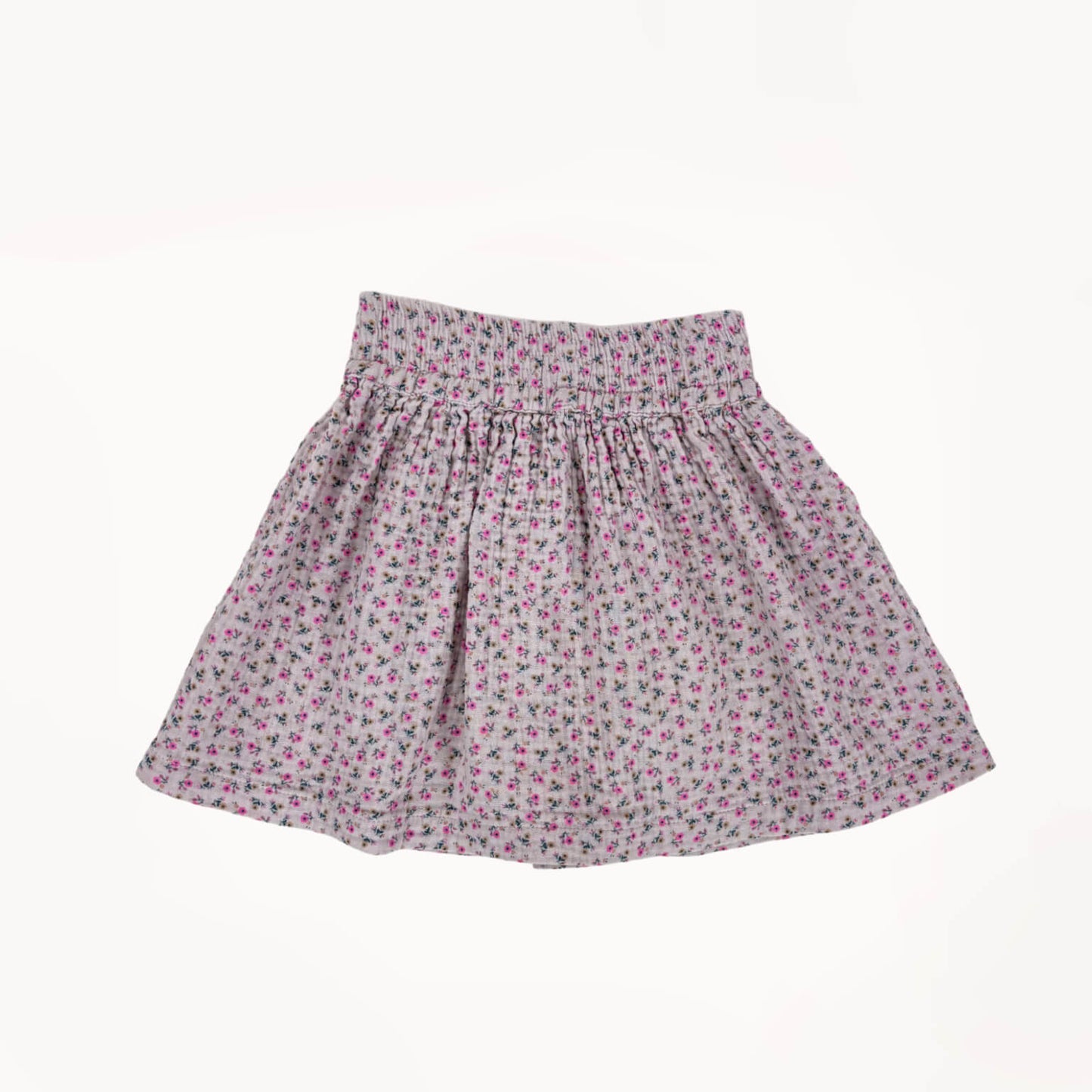 Roze mousseline rokje met bloementjes, roze strikje⎪110