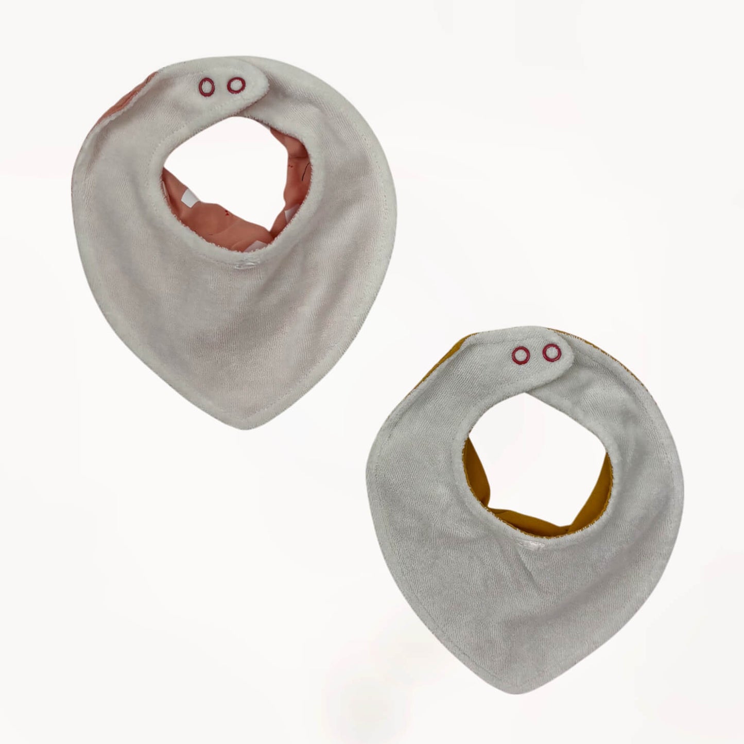 Set 2 slabbetjes roze & okergeel Hema newborn