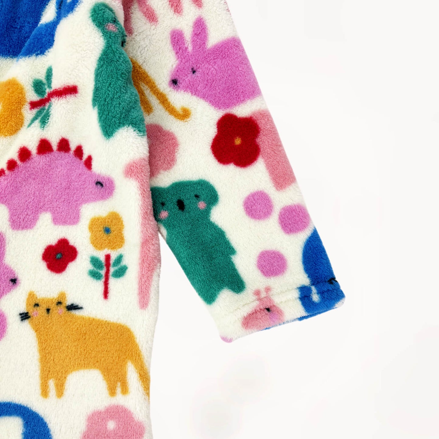 Cozy fleece pyjama onesie met kleurrijk art design, diertjes en dino's⎪80/86